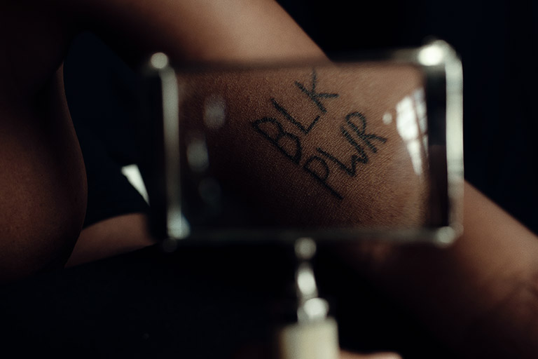 Iesha-Palmer-portrait-black-power-tatoo-by-Sane-Seven-768-wide